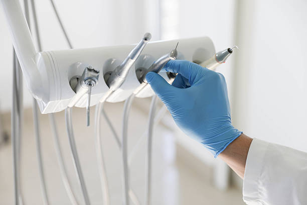 Professional Root Canal Treatment technician working in Englewood, NJ